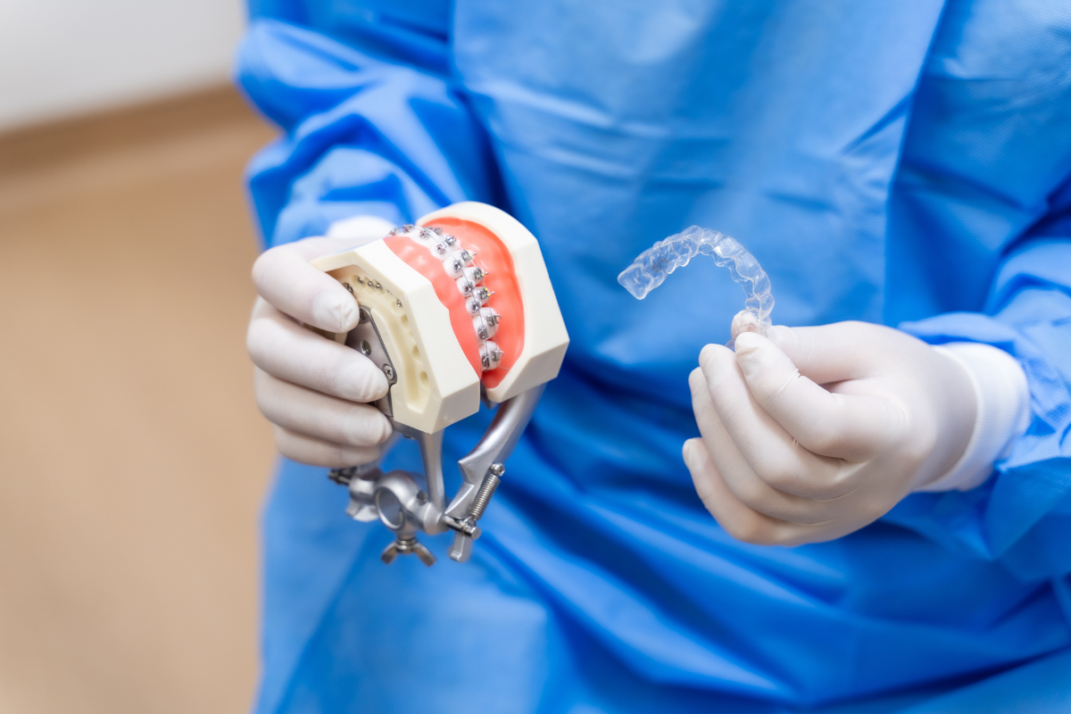 Clear aligner demonstrated on a dental model at a clinic in Singapore